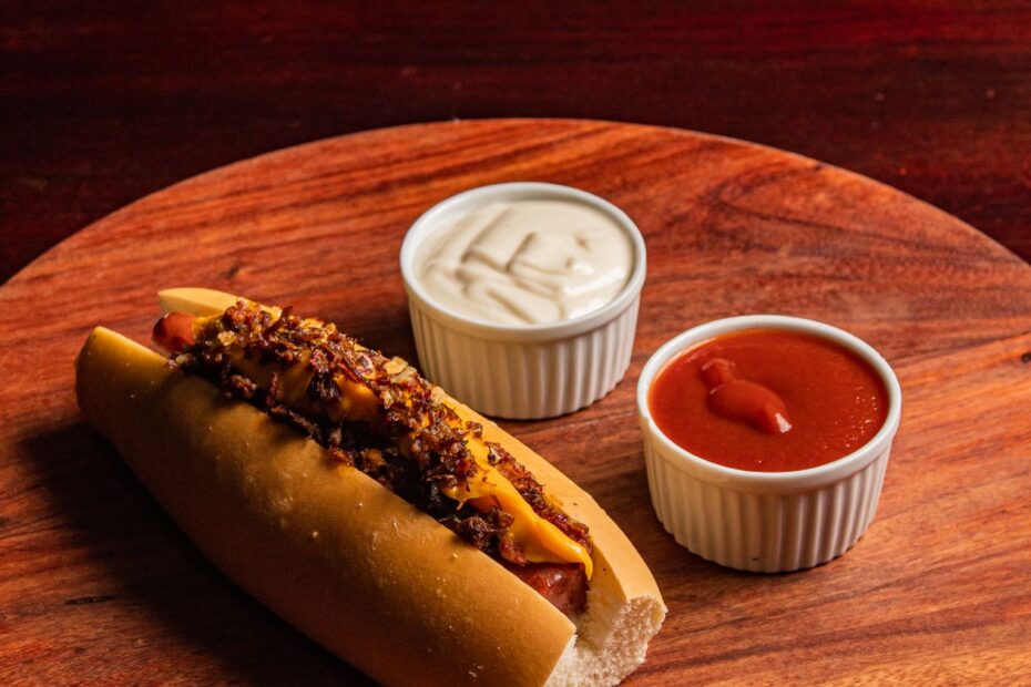 Chili cheese coney dog with mustard and onions